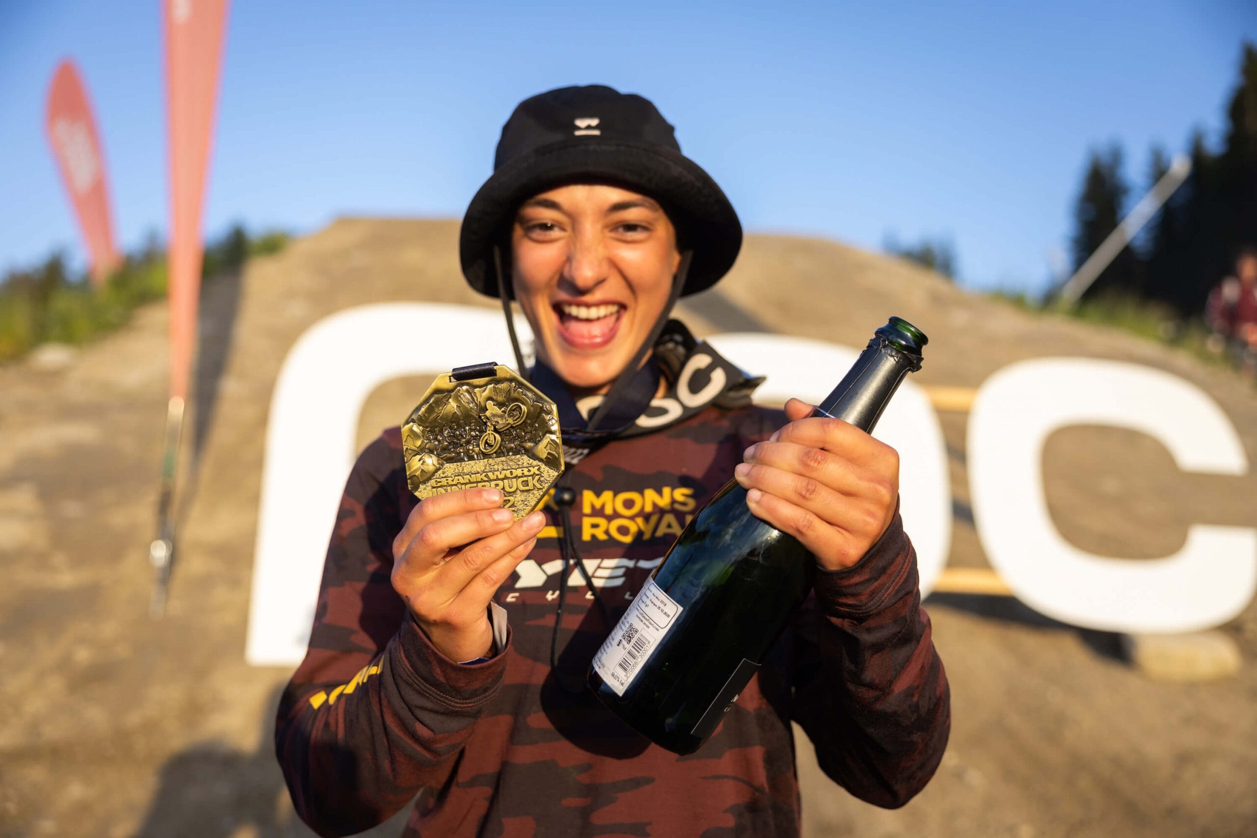 Robin with her Whip Off medal and a bottle of champagne