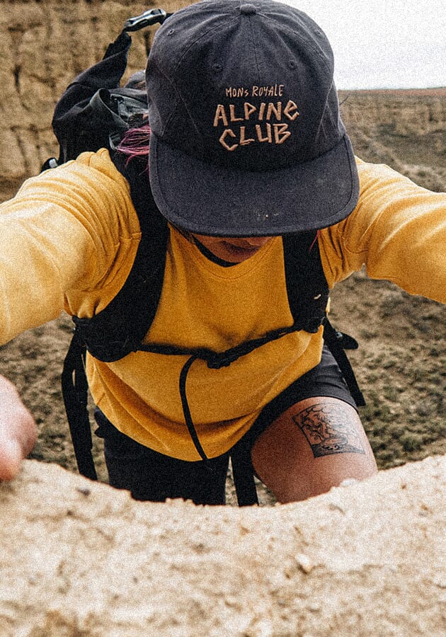 Climbing up in a merino tee